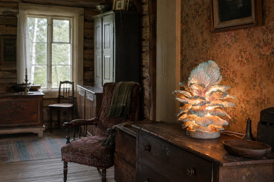 Unique sculptural table lamp in old interior. Finnish designer artist Teemu Salonen
