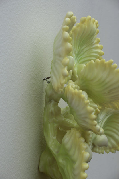 Detail how easy is to hang this wall sculpture to small nail.