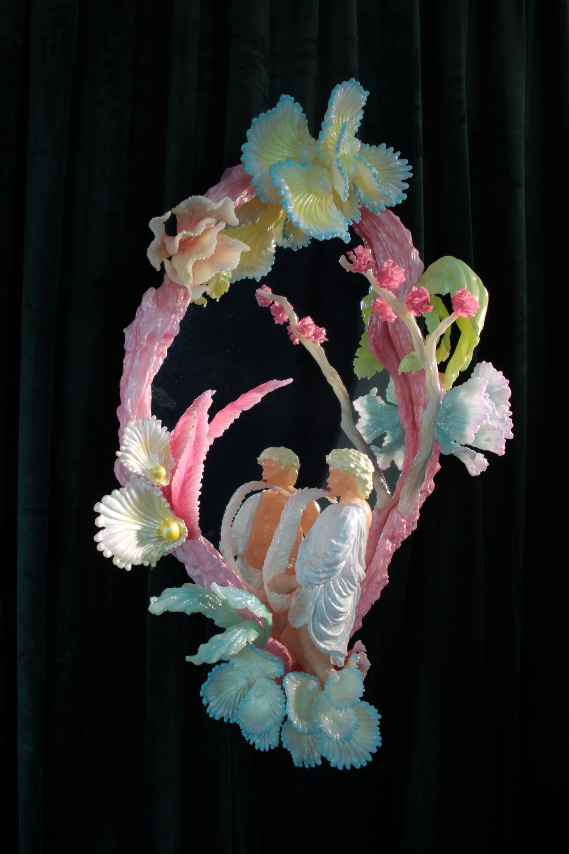 Licking leaves in the Garden — wall sculpture by Teemu Salonen, male figure before mirror with organic flowers, 2026