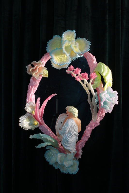 Licking leaves in the Garden — wall sculpture by Teemu Salonen, male figure before mirror with organic flowers, 2026