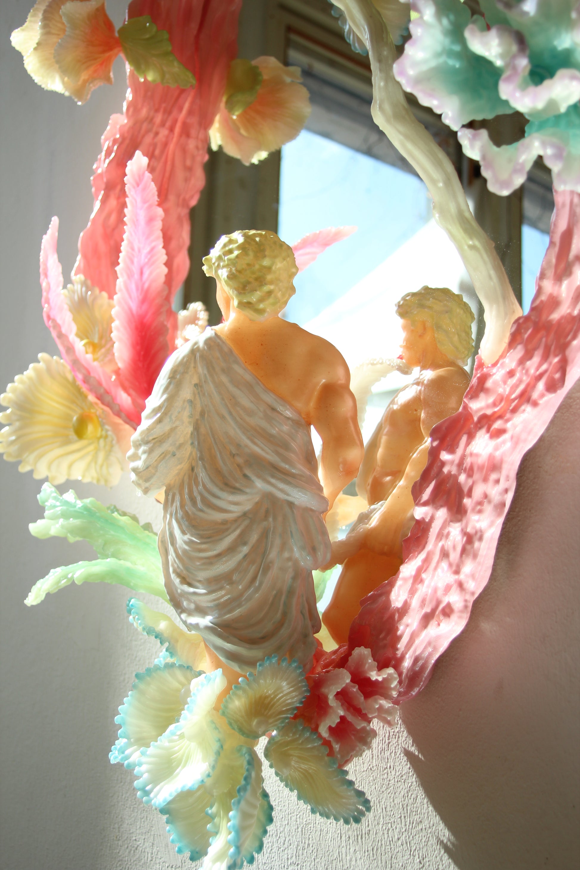 Licking leaves in the Garden — sculpture by Teemu Salonen, classical figure with mirror and tropical leaf, biopolymer, resin, paint and mirror