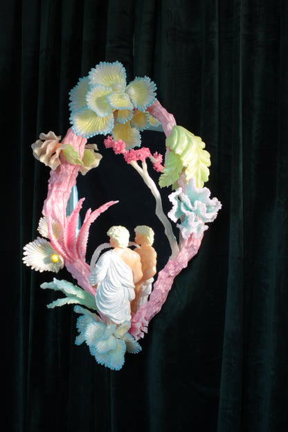 Licking leaves in the Garden — wall sculpture by Teemu Salonen, male figure before mirror with organic flowers, 2026