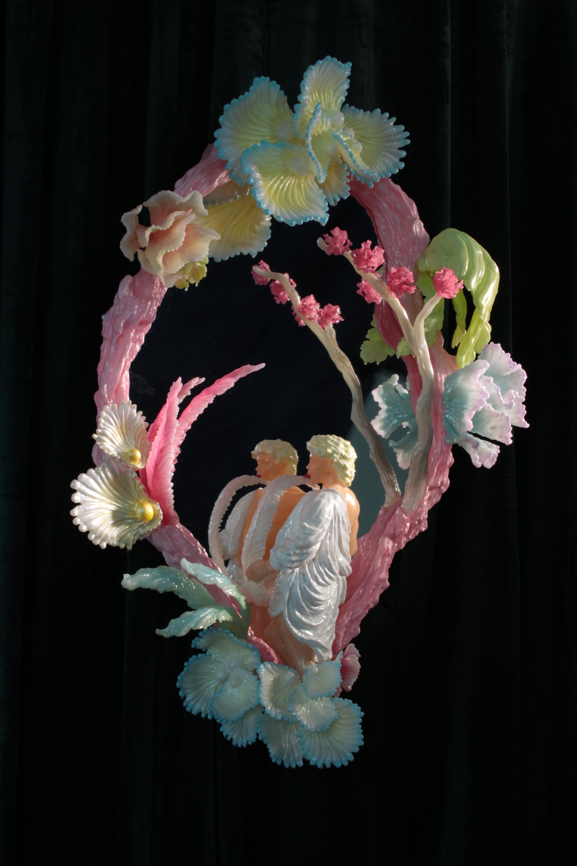 Licking leaves in the Garden — wall sculpture by Teemu Salonen, male figure before mirror with organic flowers, 2026